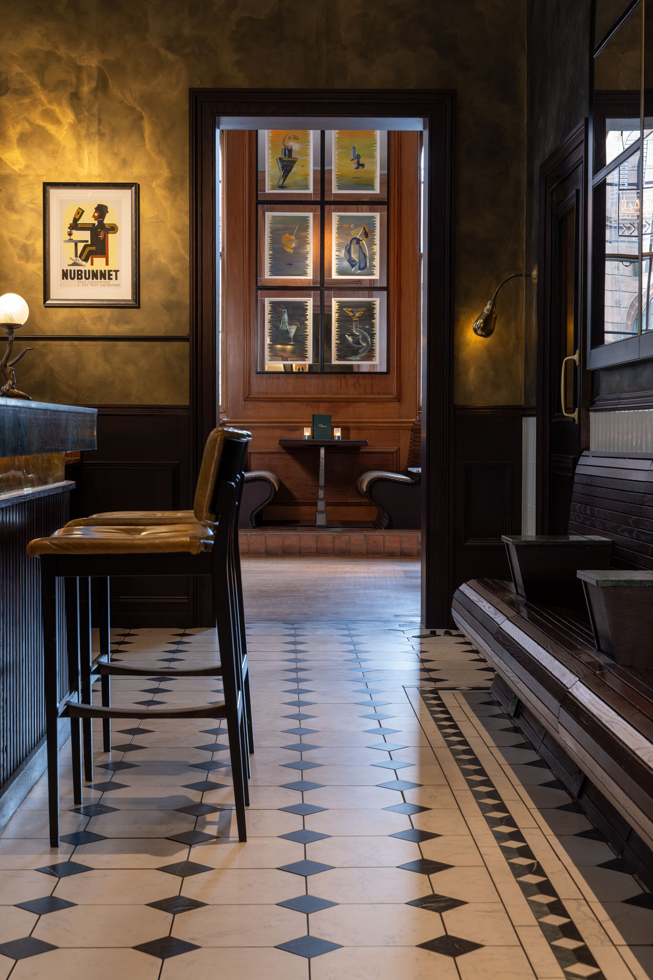 Lady Libertine interior with warm lighting and art deco details